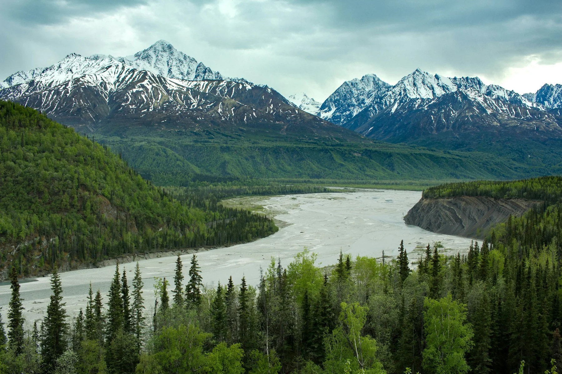 Glacial lake beneath Alaska mountains