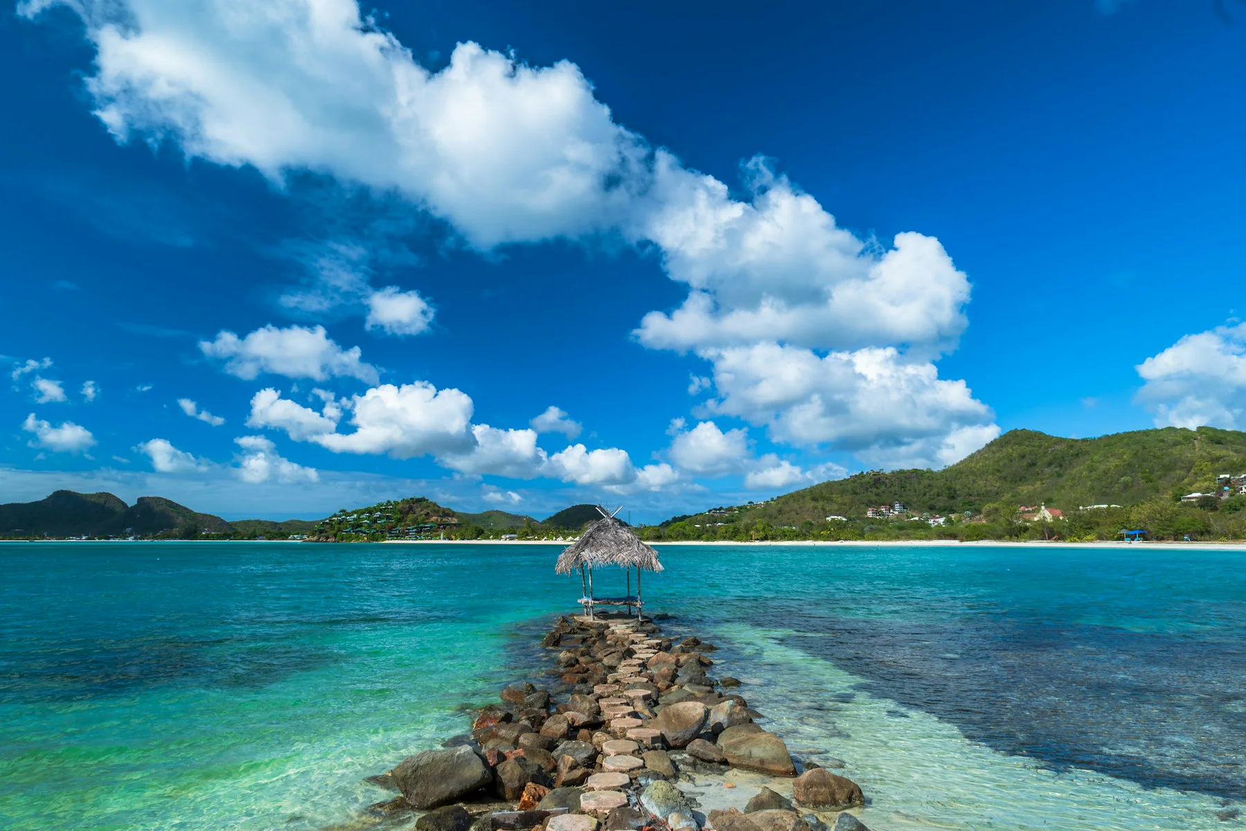 Quiet rocky beach and hut in Antigua