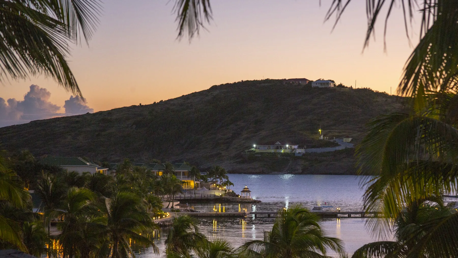 Green hills meeting the blue Caribbean sea in Antigua