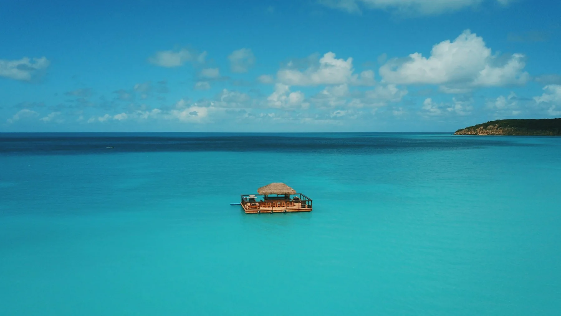 Bright turquoise water along Antigua's coast